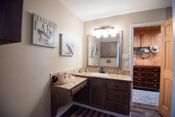 Downstairs bath with hall and queen bedroom access
