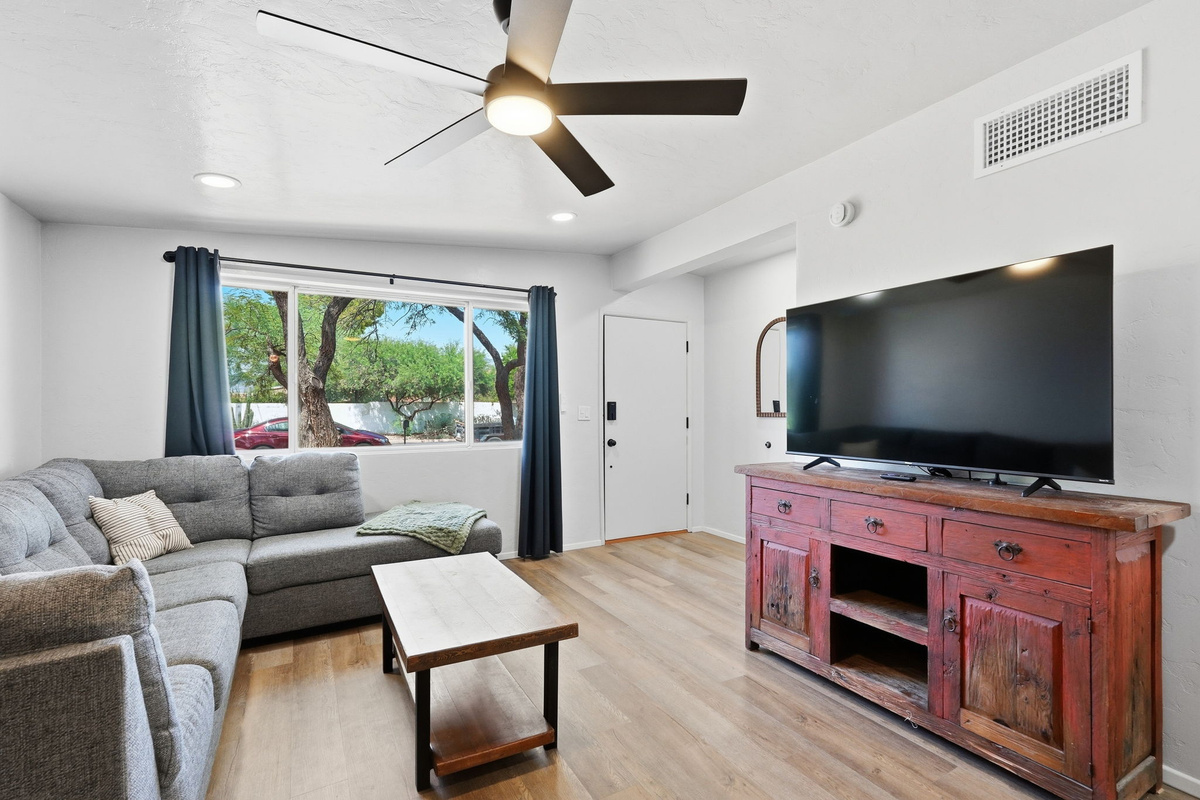 Sunlit Gathering Space: Bright, open living area designed for relaxing after a long day of exploring Tucson.