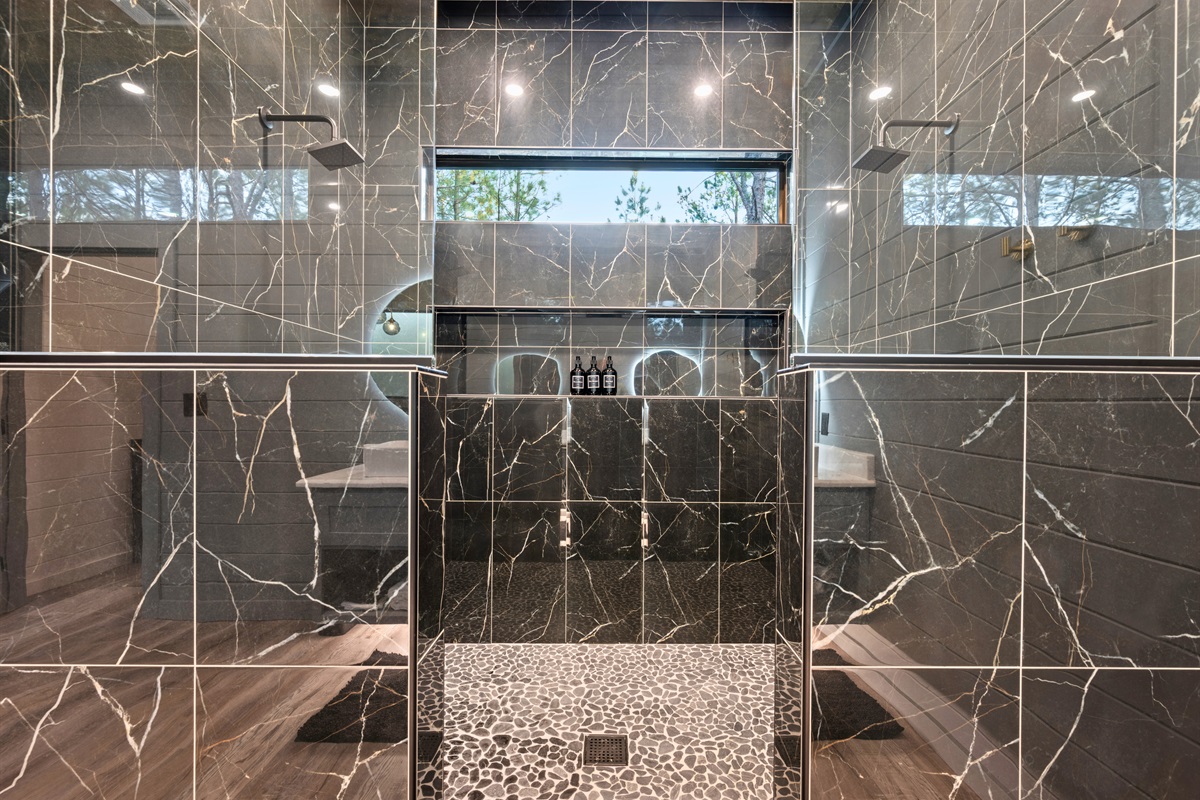 With elegant tile work and a roomy layout, the walk-in shower creates a refreshing and comfortable experience.
