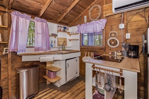 Fully equipped, electric cooktop, mini fridge, microwave, drip coffee maker, cooking basics, dishware, utensils