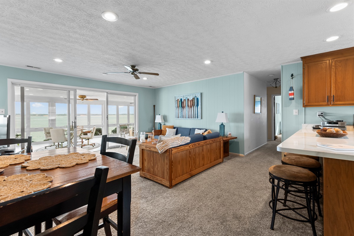 Living Room: Bright and airy with scenic views, perfect for relaxation and gatherings!