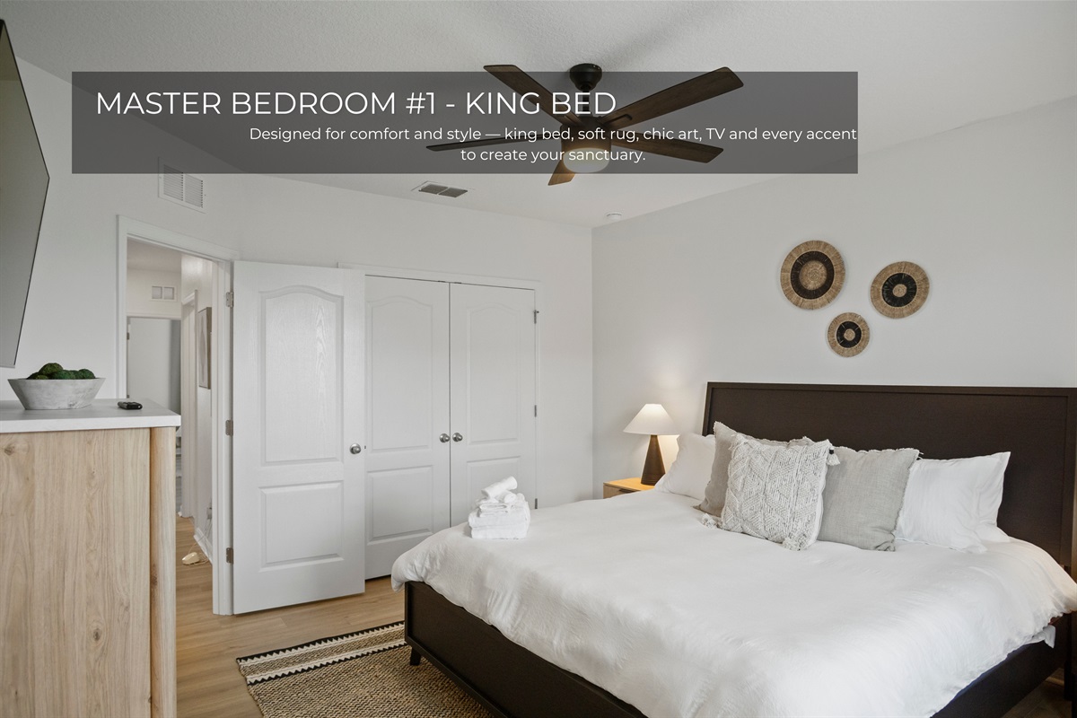 Master bedroom with a comfy king bed and private bathroom.
