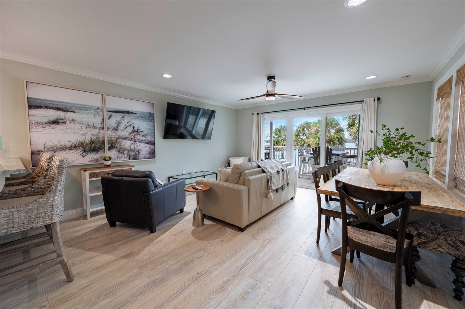 Cozy beachside living room with modern decor, ocean views, and soothing natural light.

