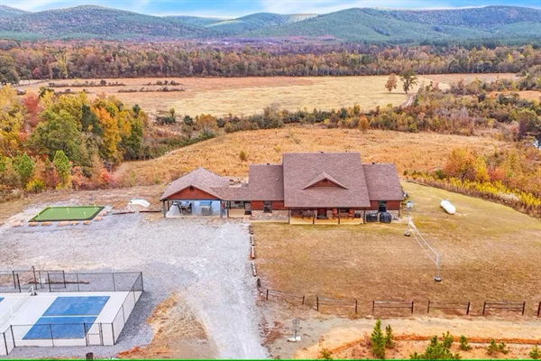 High-elevation view showcasing the cabin’s secluded ridge-top setting.