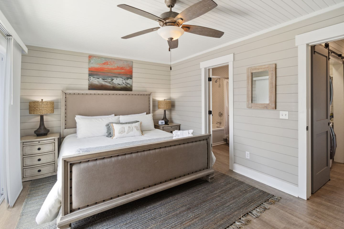 Smart TV, king bed, private bath &mdash; the second suite holds its own against the master.