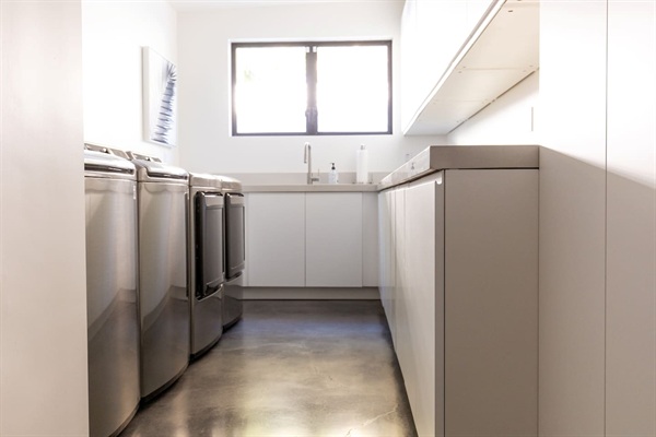 Laundry room with 2 commercial size washers and 2 dryers