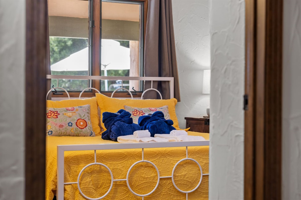 Hall bedroom with king bed