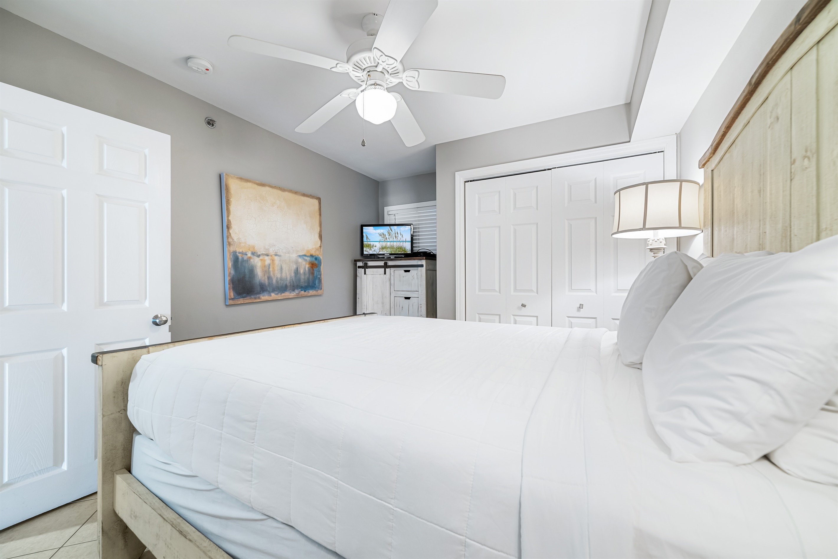 The combination of natural materials, subtle coastal accents, and abundant natural light creates a warm and welcoming ambiance.