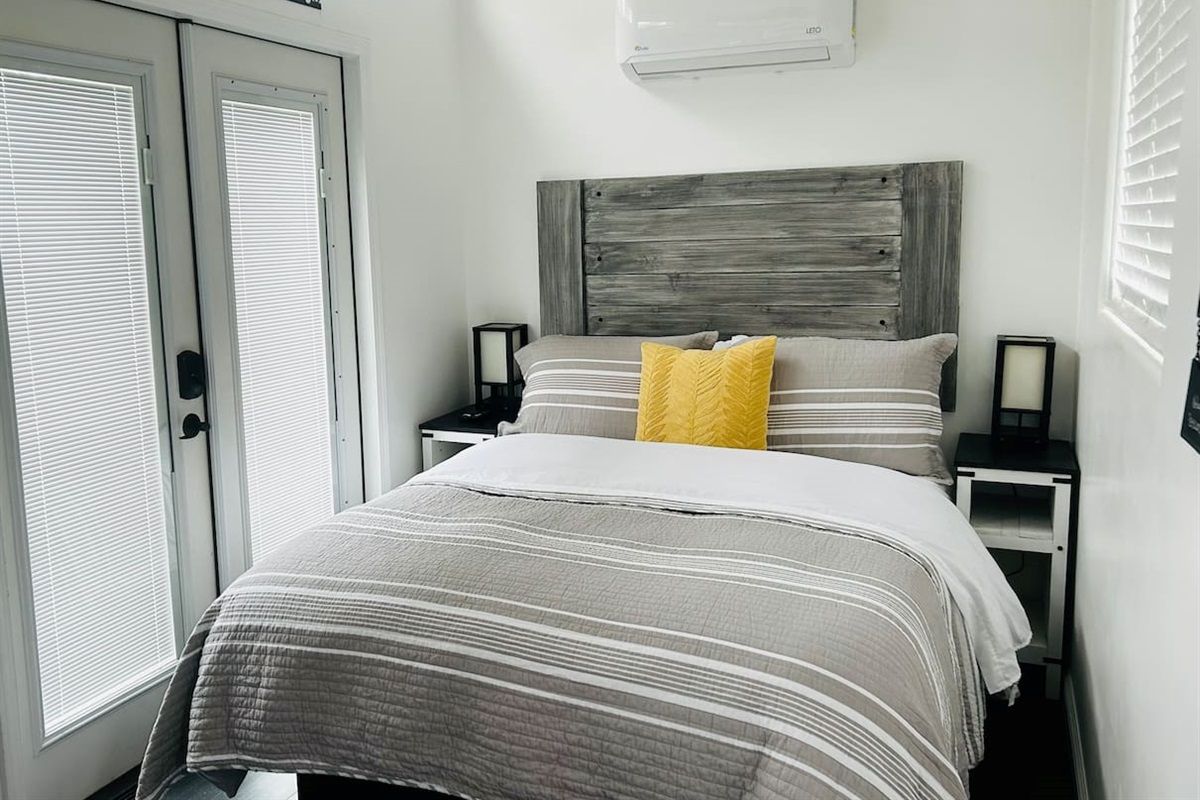 queen bed and minisplit AC in Tiny House