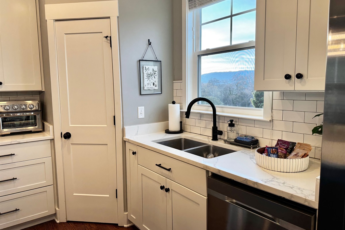 Taking dish duty doesn't seem so bad with that beautiful mountain view out the window!