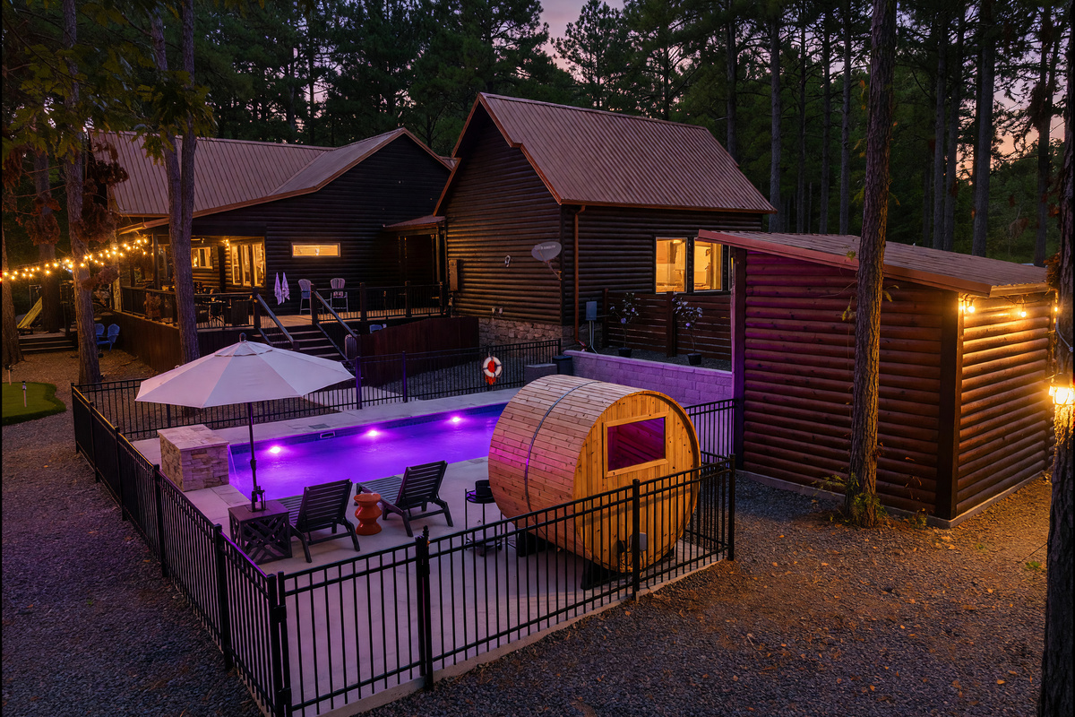 Resort-style nights at Take a Hike ✨ Enjoy the private heated pool, cedar barrel sauna, and peaceful forest setting just steps from the back deck.