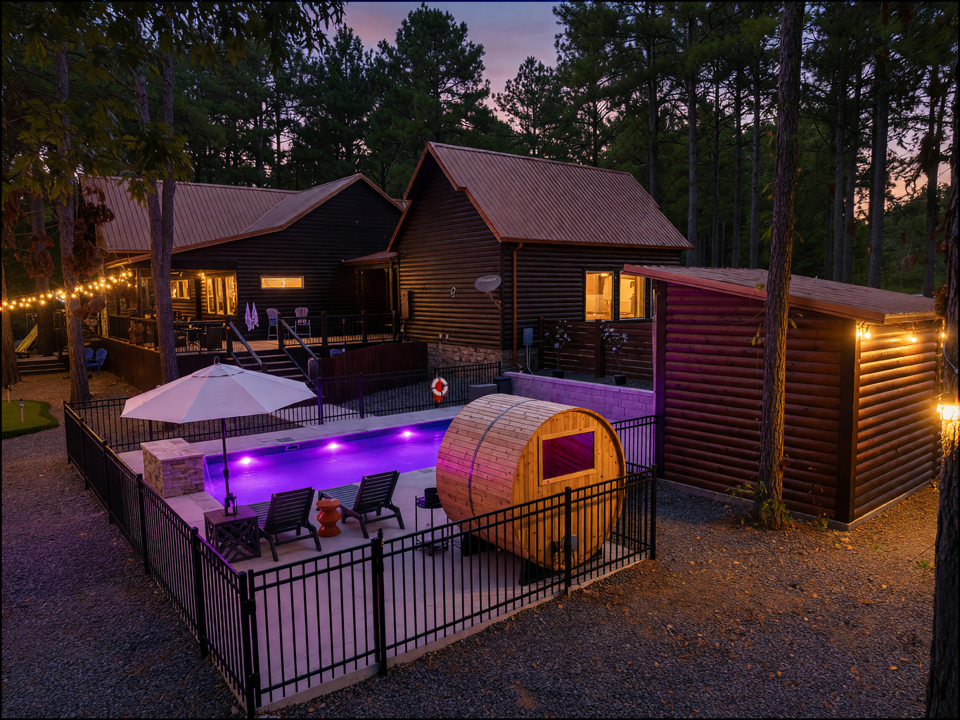 Resort-style nights at Take a Hike ✨ Enjoy the private heated pool, cedar barrel sauna, and peaceful forest setting just steps from the back deck.