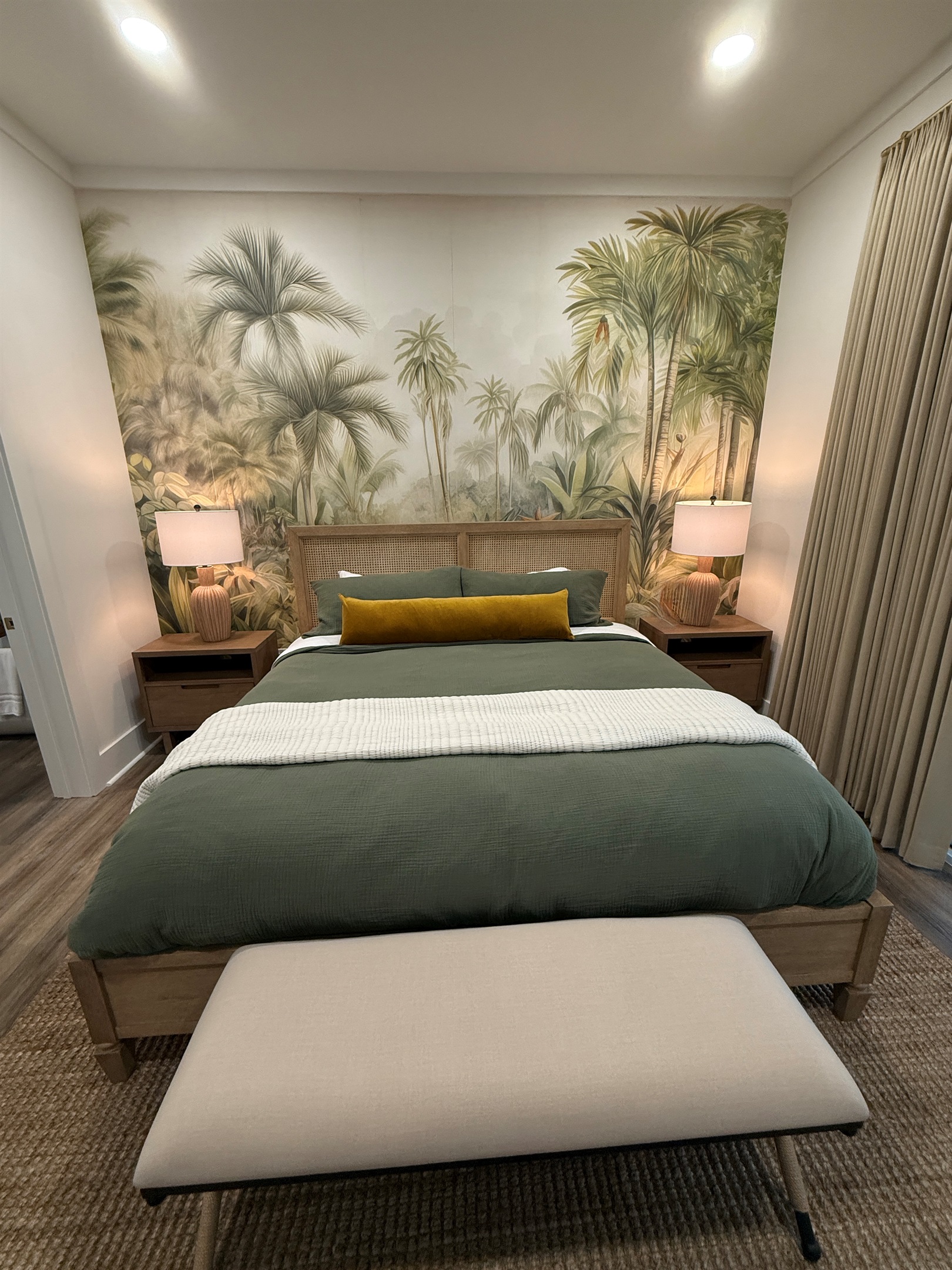 Downstairs master with jungle mural, blackout drapery