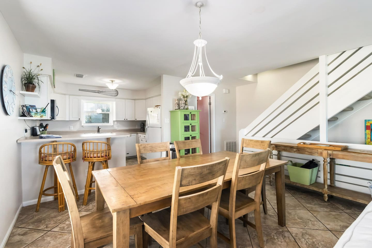 Seat the whole group around the wooden dining table and let the meal stretch as long as it wants &mdash; no rush here.