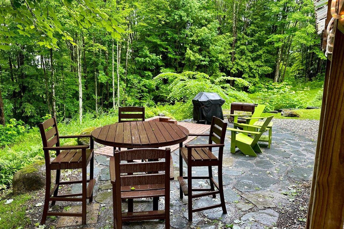 Comfortable outdoor area with grill