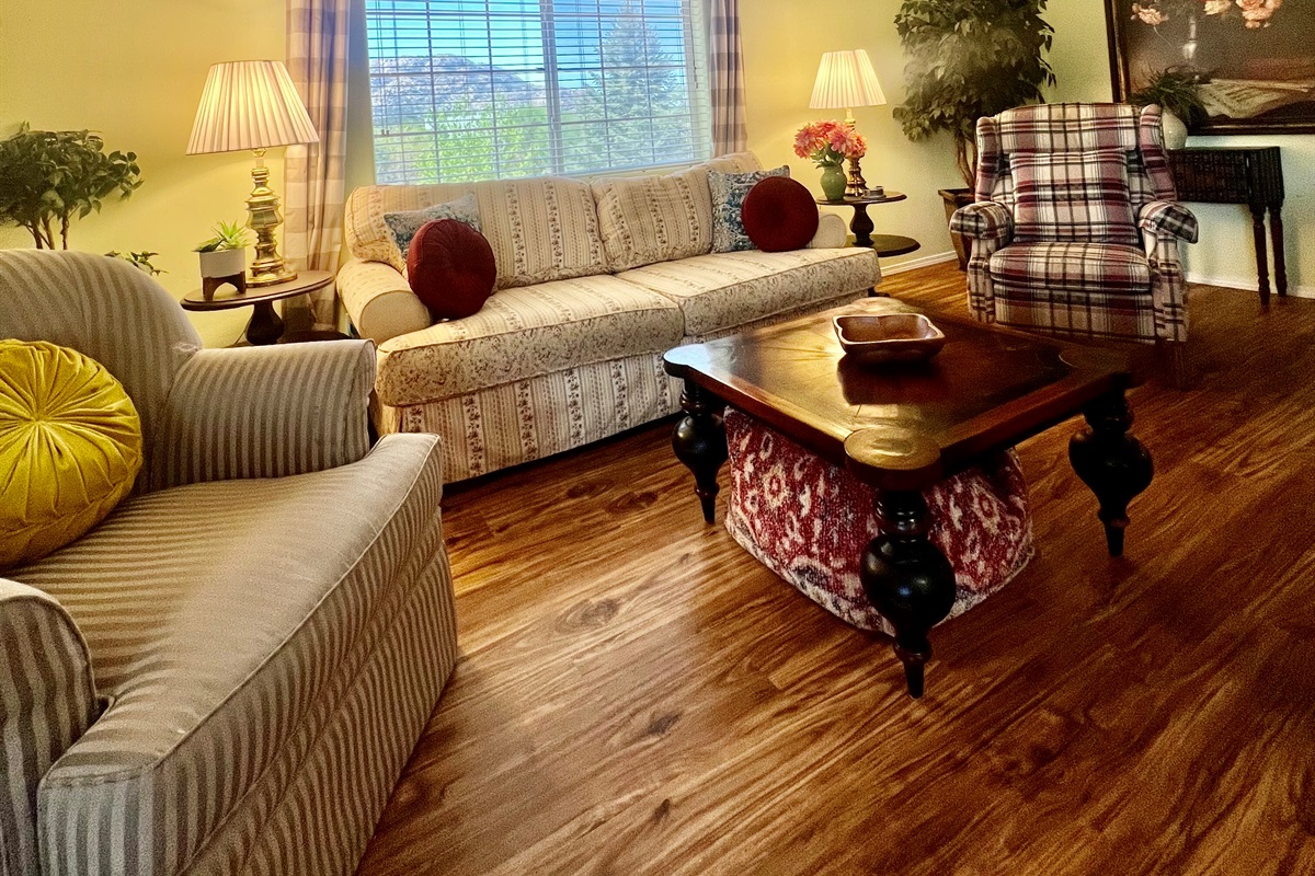 Experience true relaxation in the inviting living room, bathed in natural light