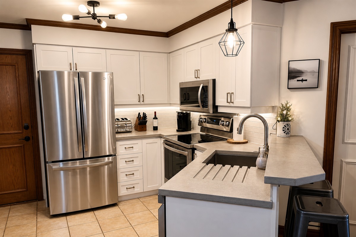 Fully equipped kitchen with beautiful concrete countertops.