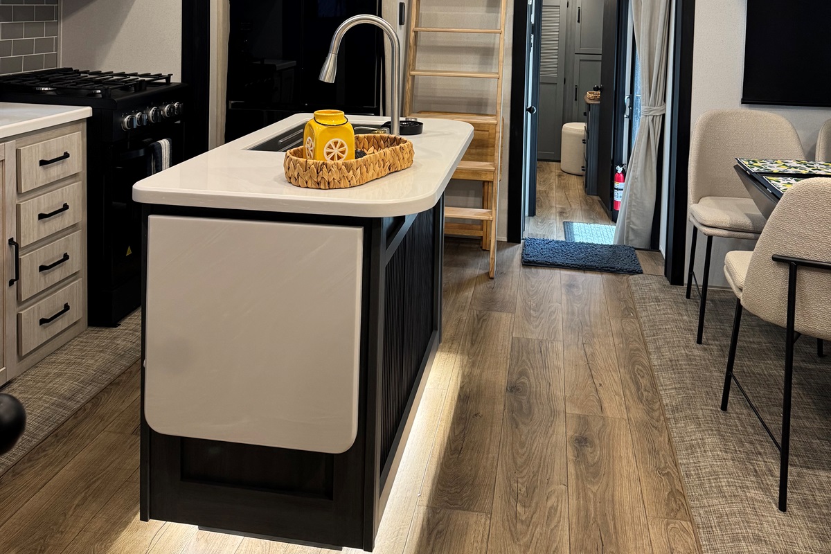 Kitchen leading up to one loft room