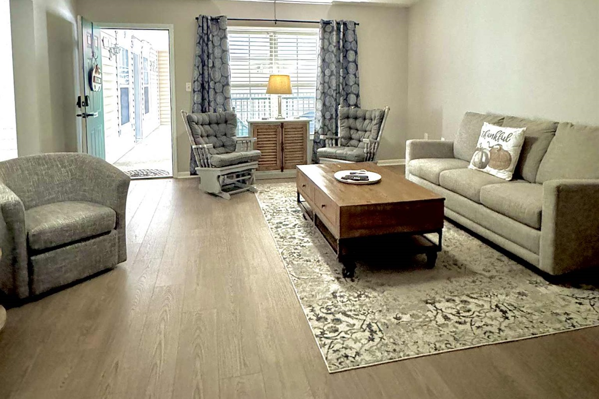 Queen Sleeper Sofa In Living room with flat screen smart tv