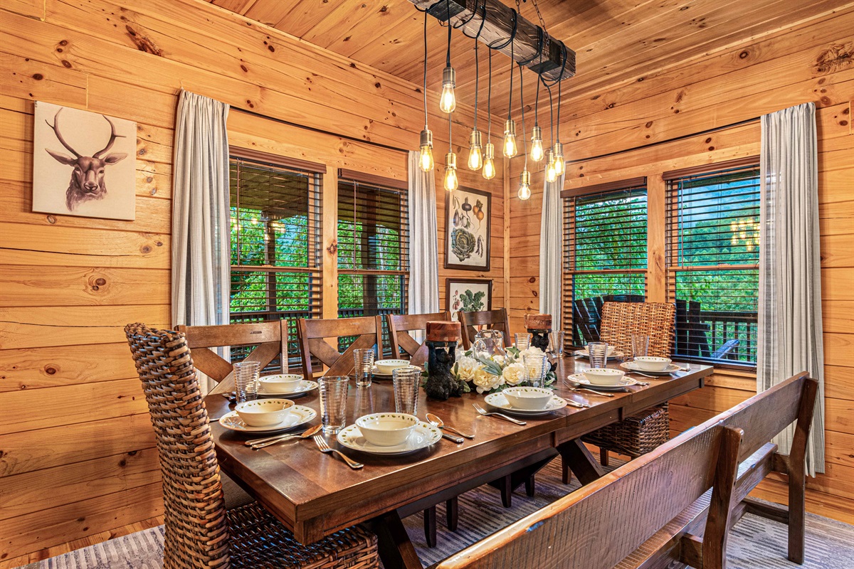 Dining Room: Gather around the stunning wood table under vintage lighting for unforgettable meals!
