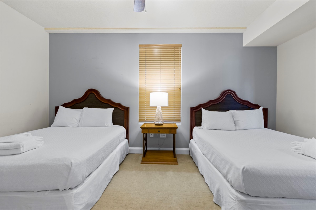 Guest bedroom with two queen beds