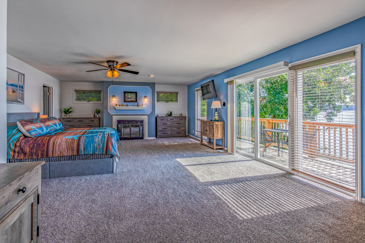 Wake to abundant natural light and generous space in the upstairs primary suite.