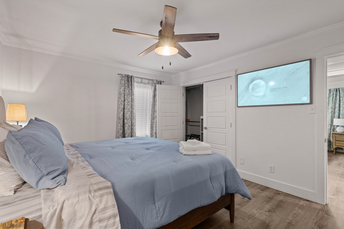 Large Smart TV in Master Bedroom