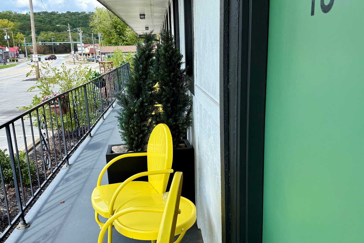 Sitting area by your room. Front street side room.