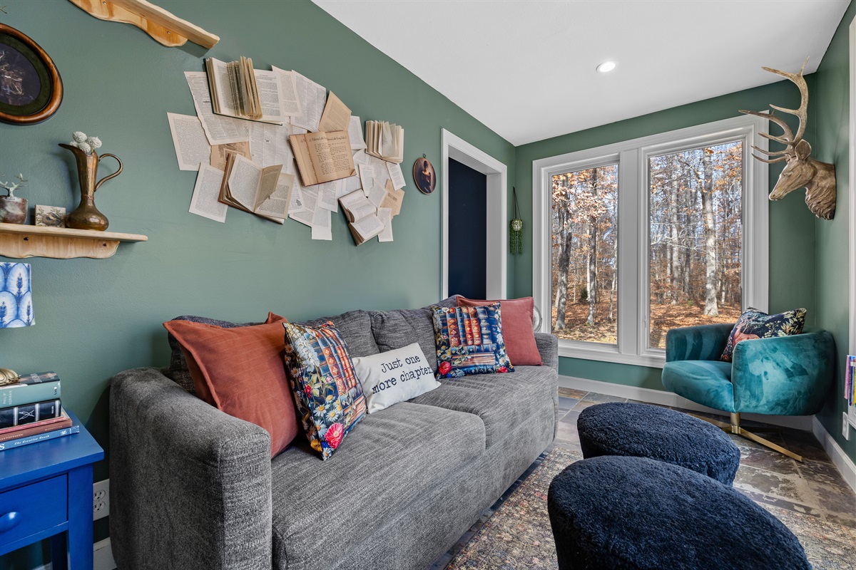 Reading room sofa opens to queen bed.