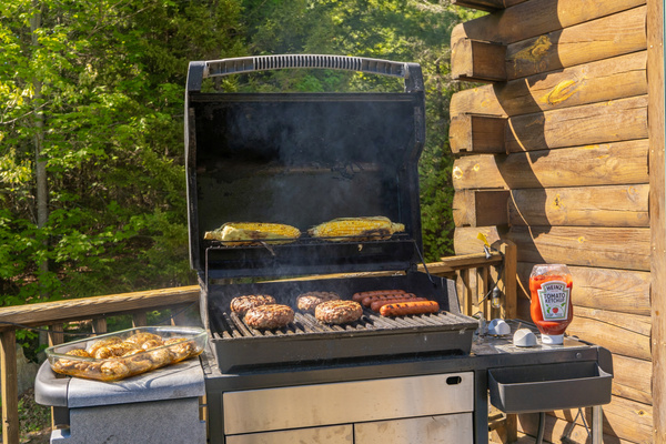 Fire up the grill and enjoy outdoor cooking with beautiful woodland surroundings.
