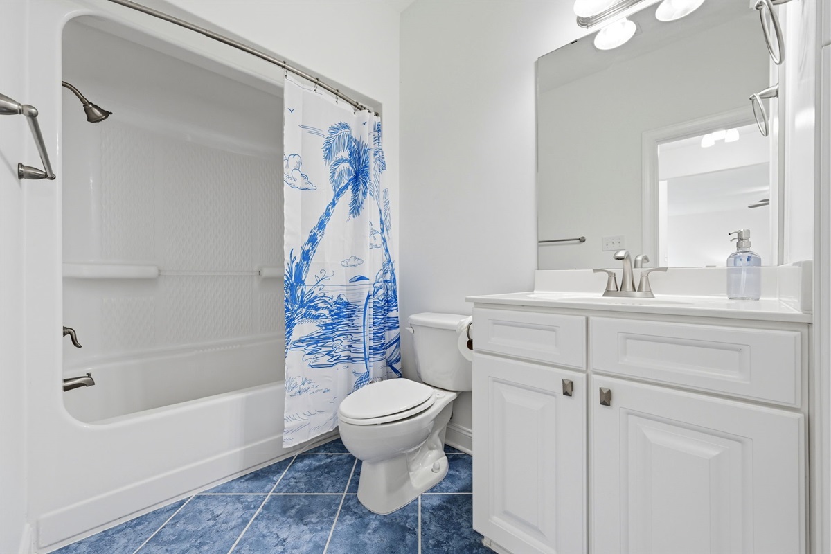 Fresh and bright bathroom stocked for a comfortable stay
