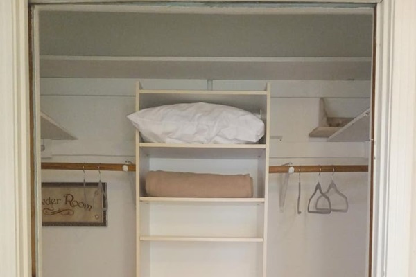 Closet space includes generous clothing hanging, shelf and drawer space for short or long term stays.

Extra, sheets, pillows and blankets are provided  in each closet.