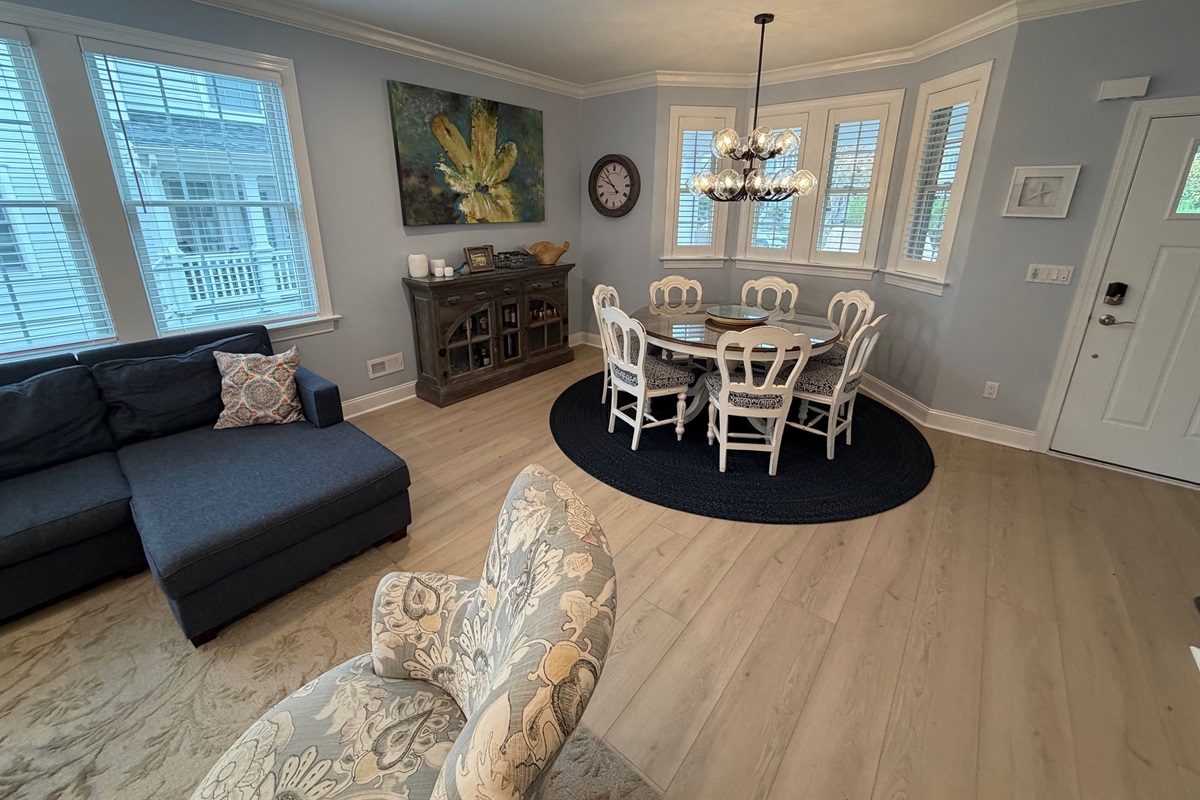 Dining area after addition, note the additional space between the living room and dining area.