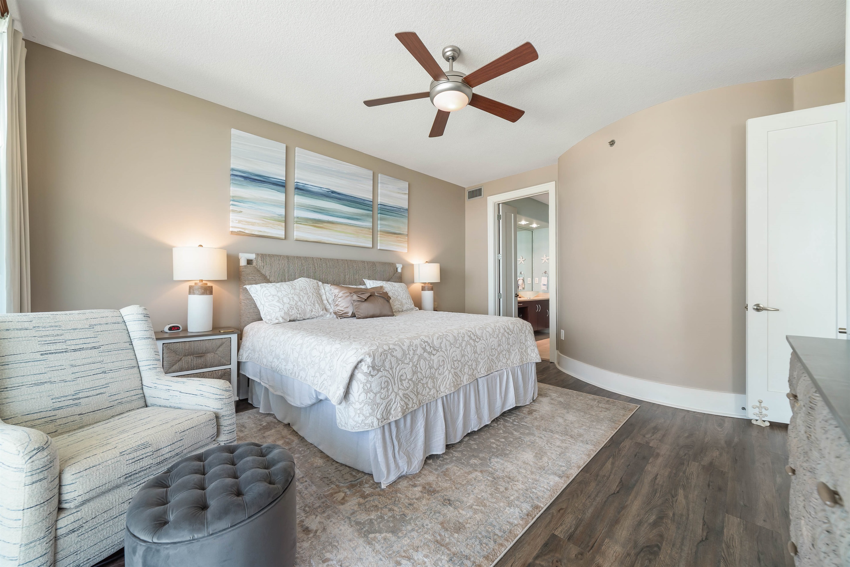 A peaceful haven with breathtaking views. This Primary bedroom with king-size bed offers a tranquil escape, where comfort and beauty meet in perfect harmony.
