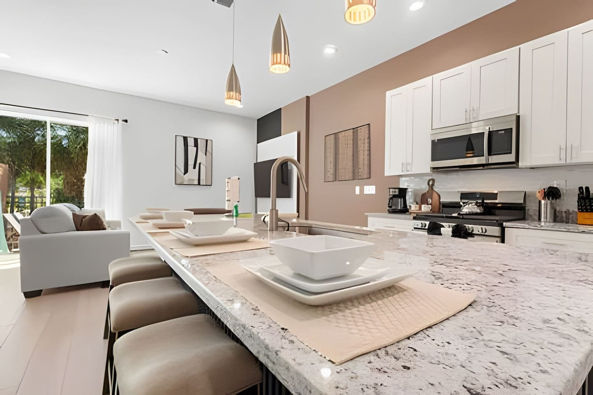 Enjoy a meal at the spacious kitchen counter, ideal for quick bites or casual conversations.