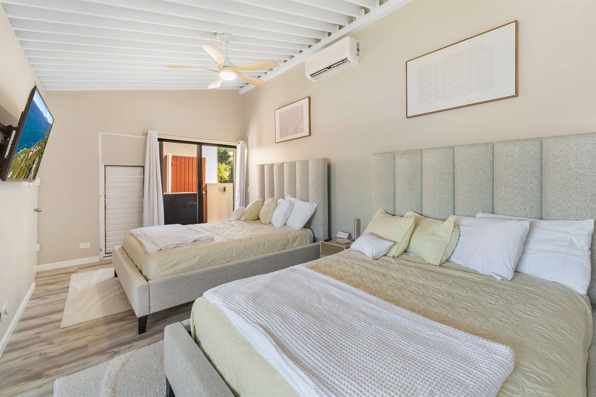Two queen beds in the guest bedroom