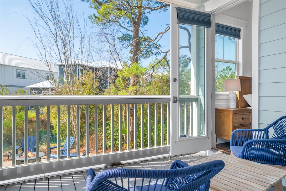 Enjoy the peaceful backyard and views of the pond from the back screened-in porch.