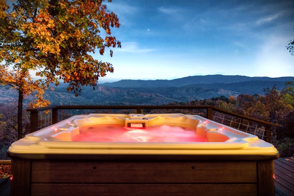 Just you, your loved ones and nature in this hot tub with that sweeping mountain views.
