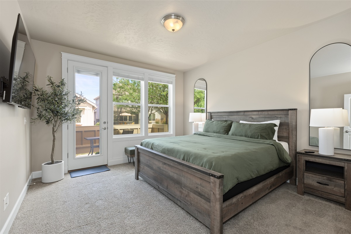 Master Bedroom with patio access for fresh morning air.