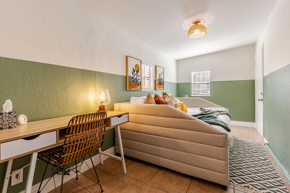 Bright, stylish room with playful decor and a perfect work nook for your getaway!