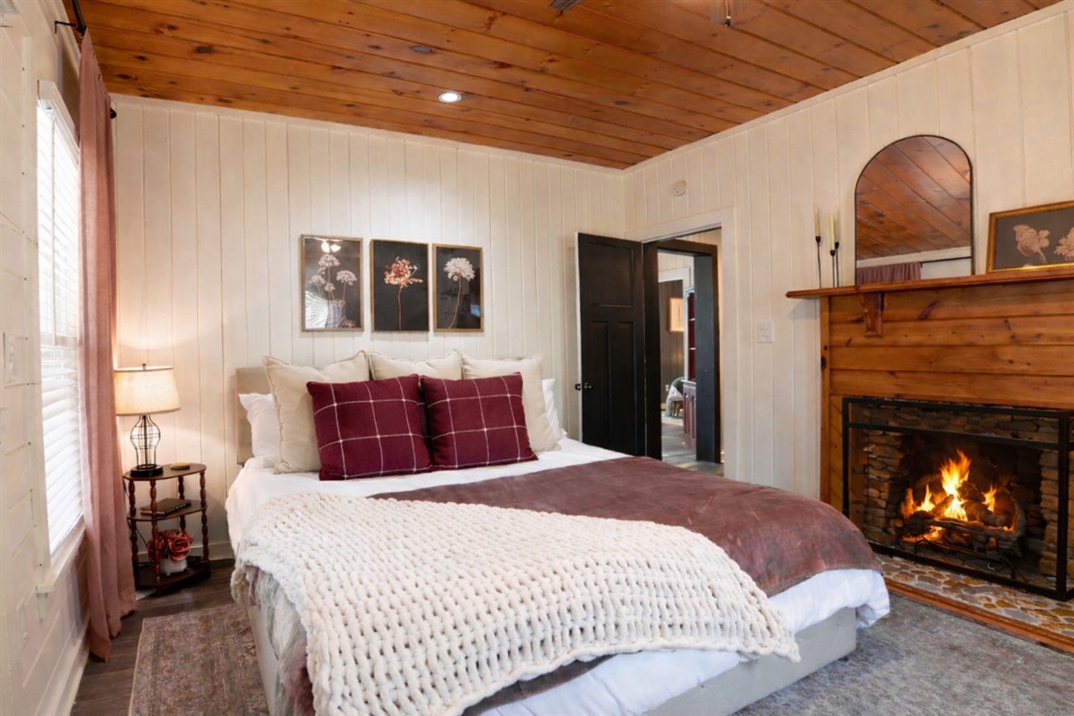 A king bed, a glowing fireplace, and nowhere else you need to be.