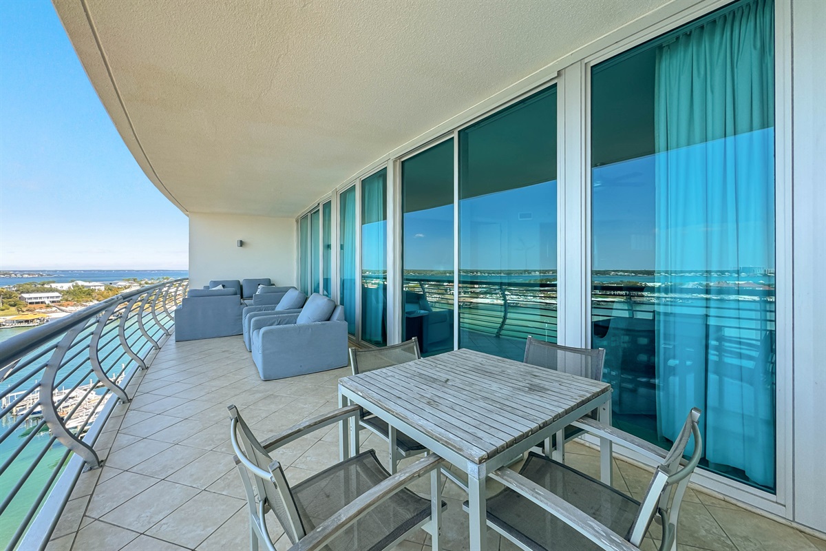 Unwind on this expansive balcony and soak in panoramic water views. A perfect retreat for relaxation and enjoying the coastal breeze.