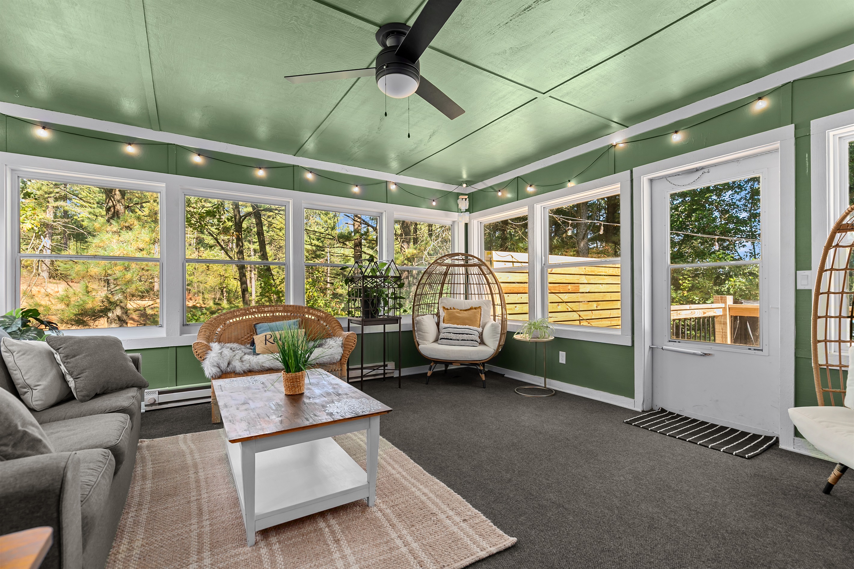 Guests enjoy the festive glow of the bistro lights, adding a touch of charm to evenings outdoors.