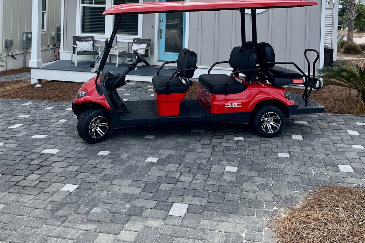 Six-seater golf cart included!