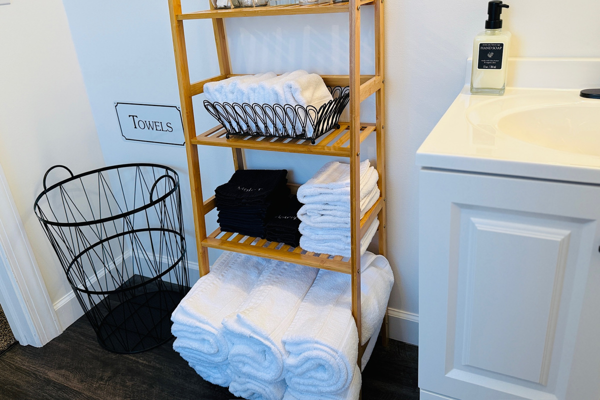 Bathroom drawer is stocked with personal-care and emergency toiletries.
