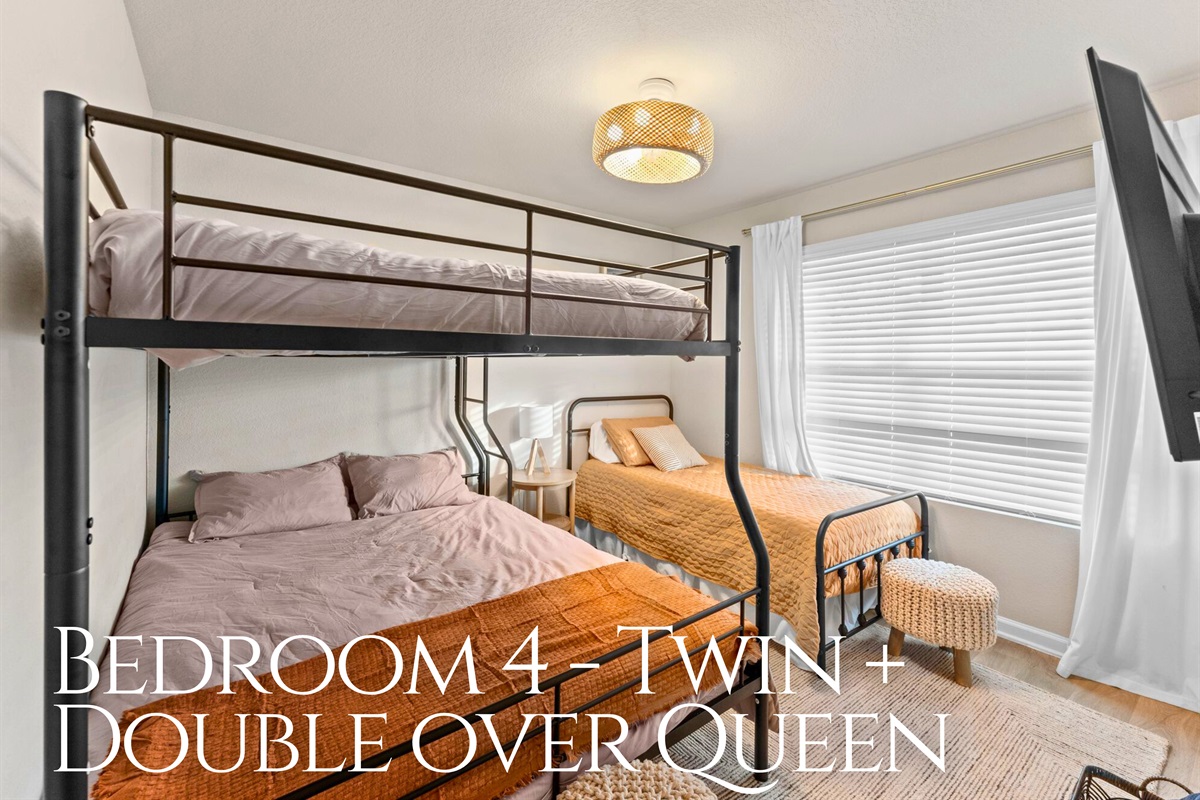 Lastly, the fourth bedrooms features a unique bunk setup with a twin and double over a queen, making it a great option for kids, teens, or groups traveling together.