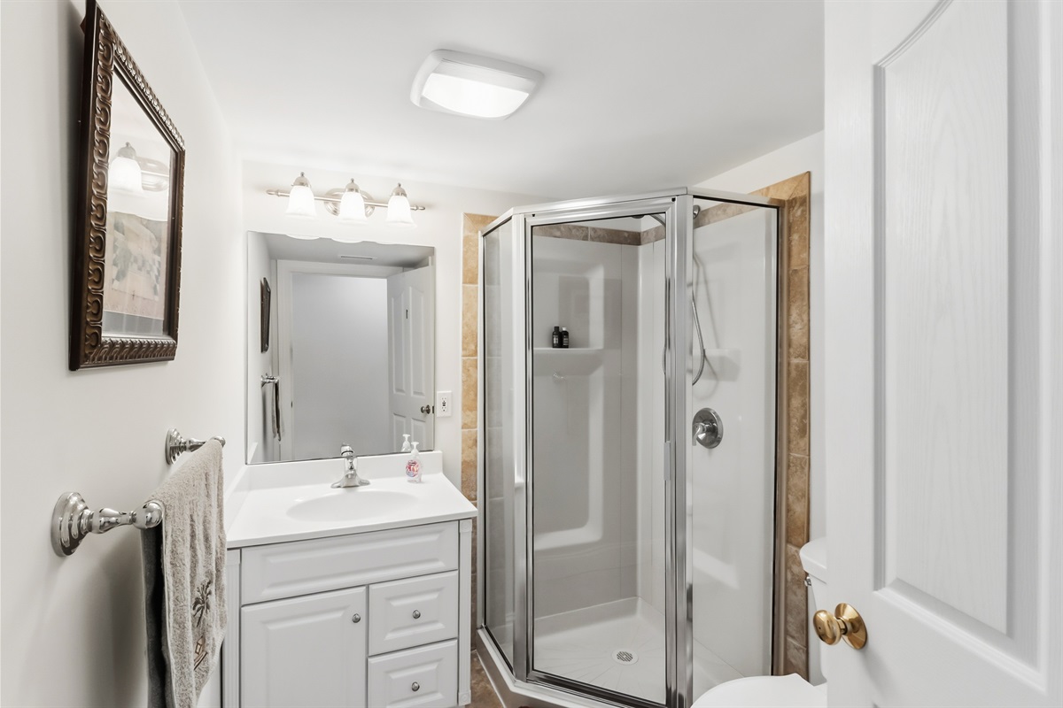 Full bathroom with a walk-in shower
