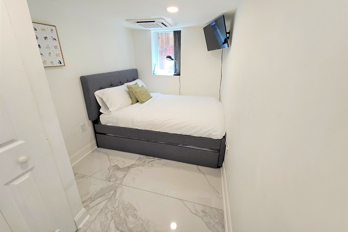 Bedroom #11 on the lower level has a full bed with a twin trundle underneath