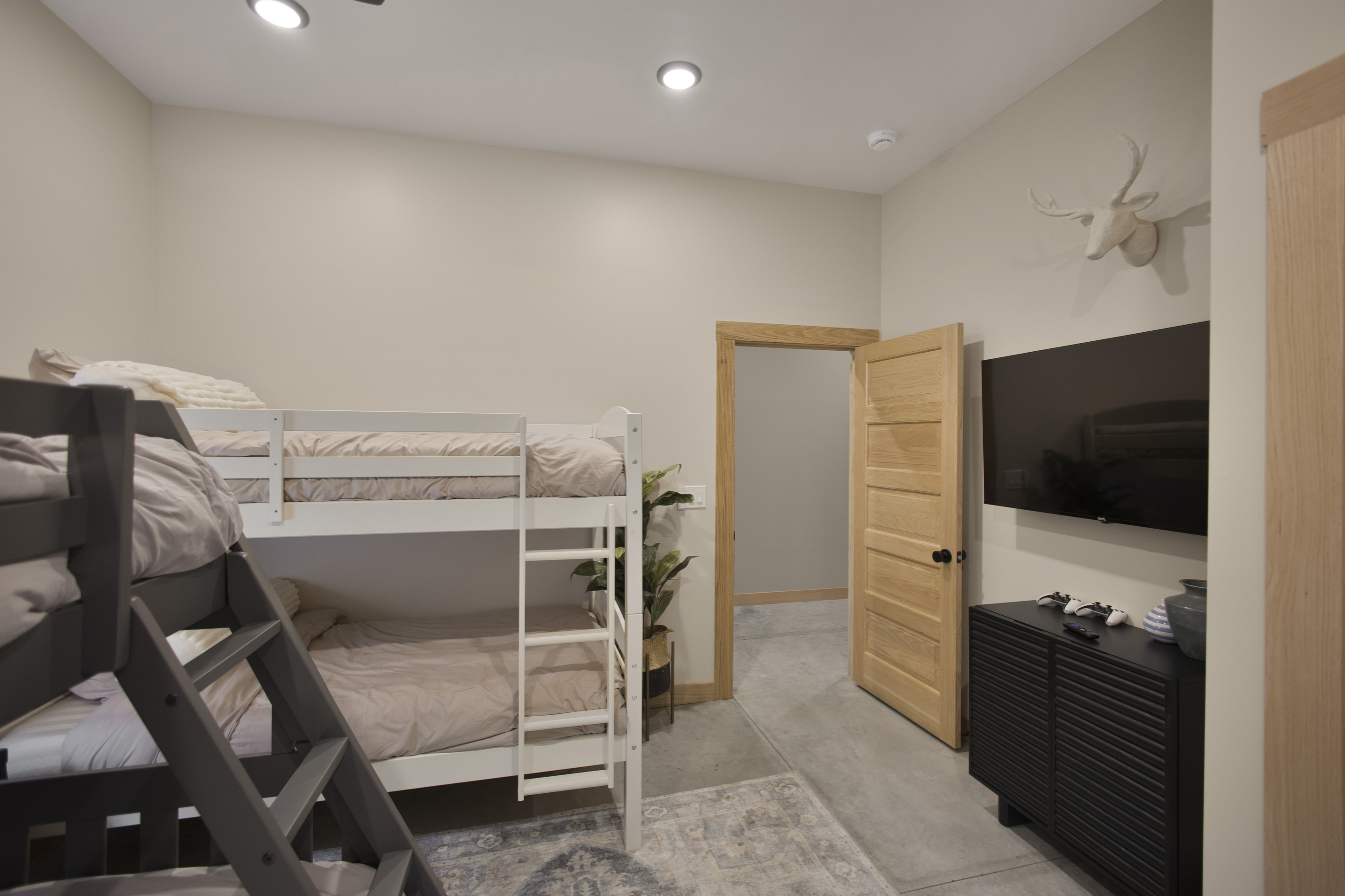 Bunk Room with vintage video game console