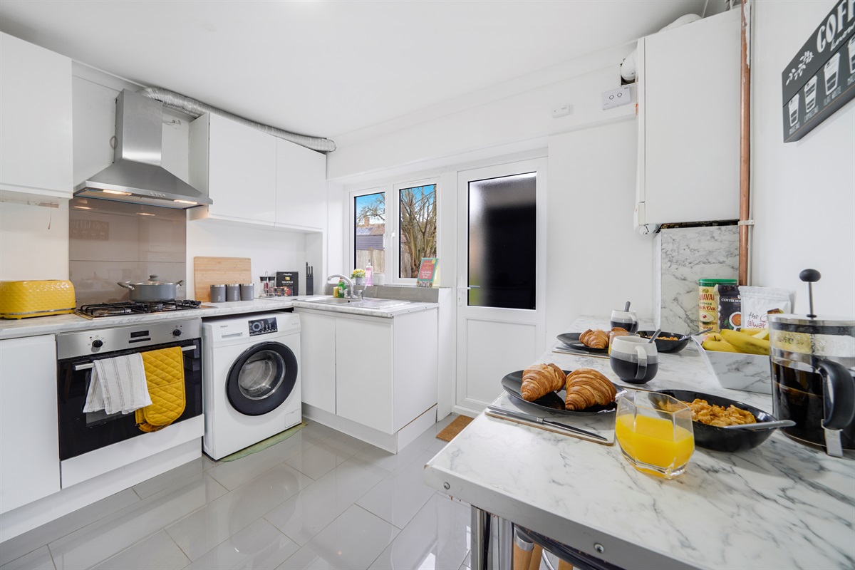 [Kitchen with toaster microwave  XL air fryer breakfast bar]